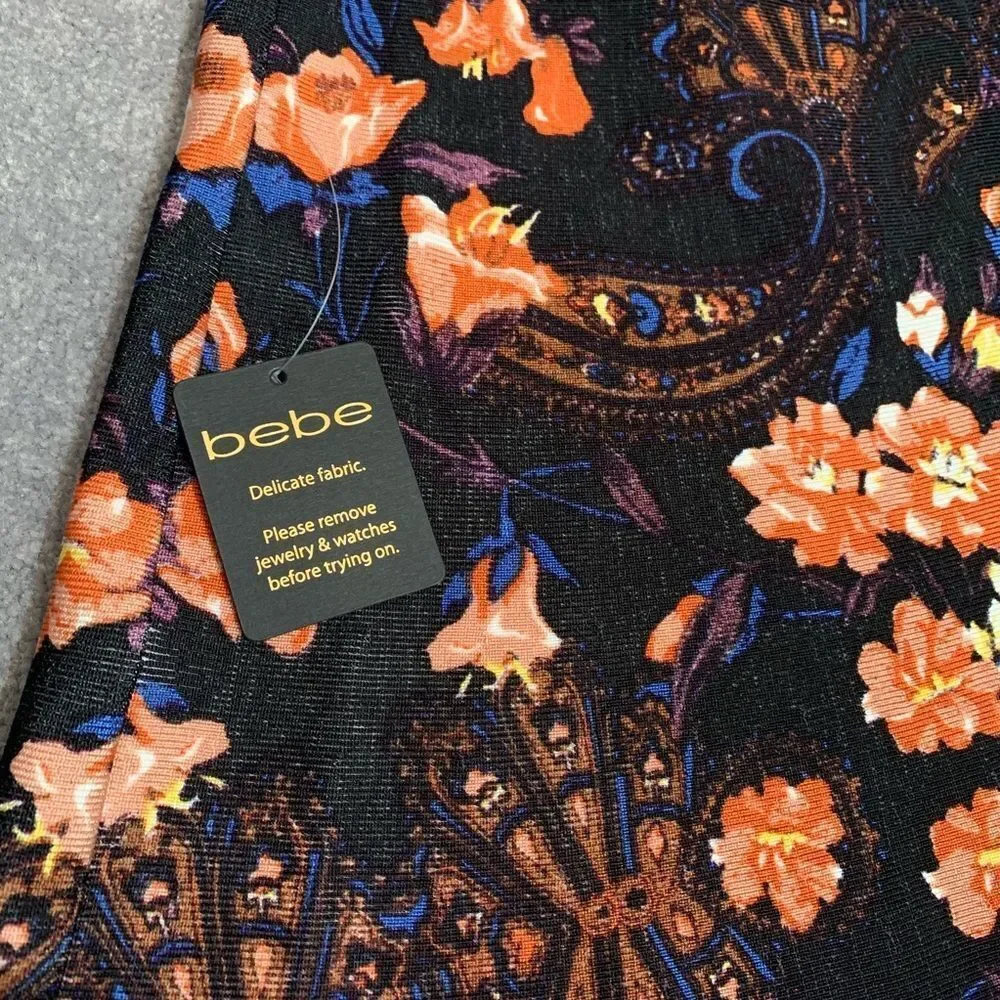 — BEBE — NWT gorgeous floral printed bandage skirt